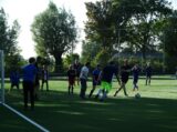 Laatste training S.K.N.W.K. JO11-1JM van seizoen 2022-2023 (partijtje tegen de ouders) (145/221)